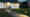 Der Zuweg zu einem Einfamilienhaus durch den Vorgarten: Wandleuchten beleuchten die Fassade, Sockelleuchten werfen Licht auf den Weg. (Foto: Prediger Lichtberater) imageThumbnailAlt
